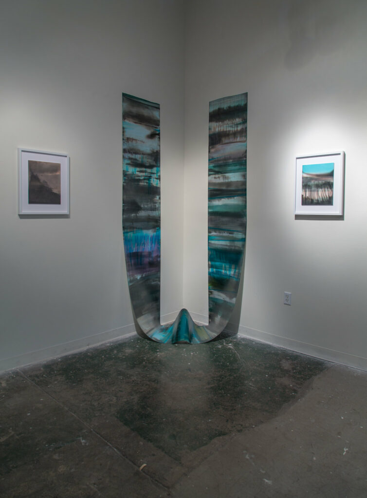 installation of abstract prints on silver gelatin paper