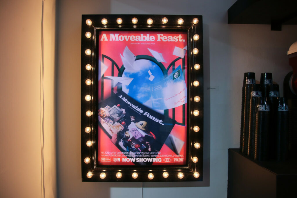 A custom-made movie poster box featuring a poster for "A Moveable Feast", the student's thesis show