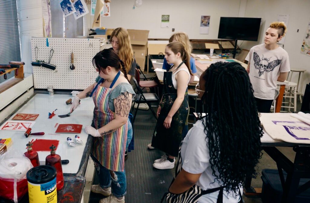 Instructor shows students how to print