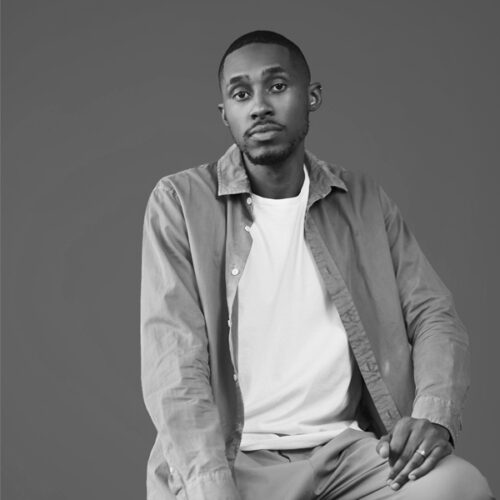 Man sitting and looking at the camera