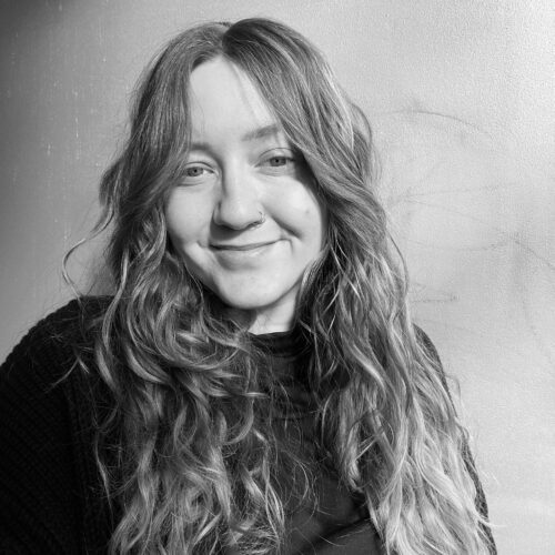 Woman with long hair smiling