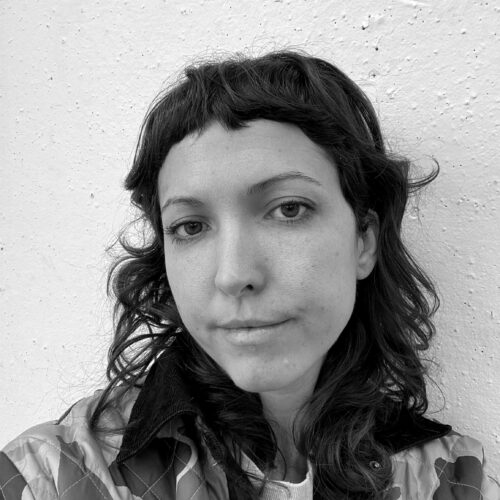 black and white picture of woman with long curly hair